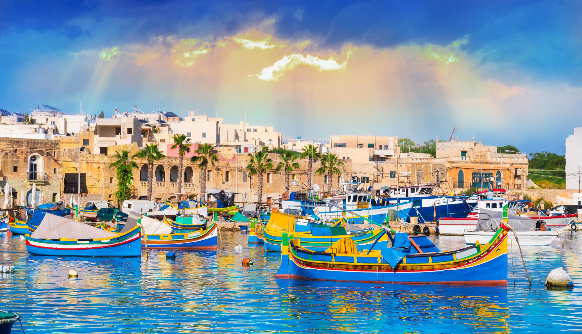 Marsaxlokk,Village,Harbor,Of,Malta,,With,Boats,On,The,Sea